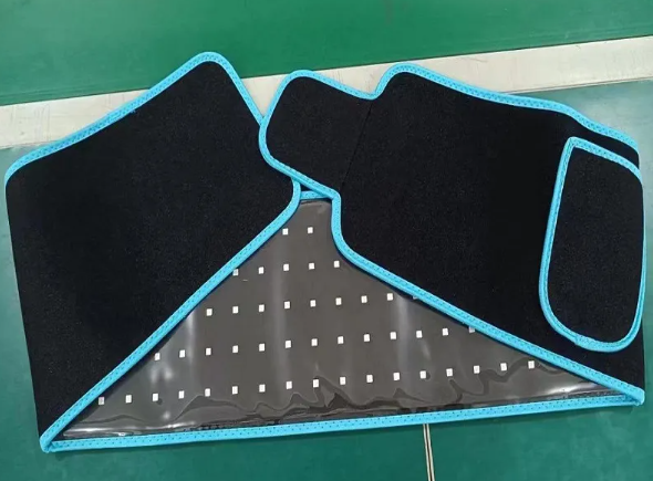 Car floor mats with blue trim on a green surface