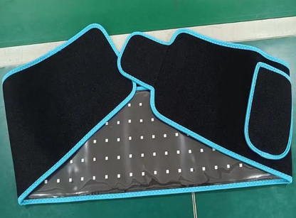 Car floor mats with blue trim on a green surface