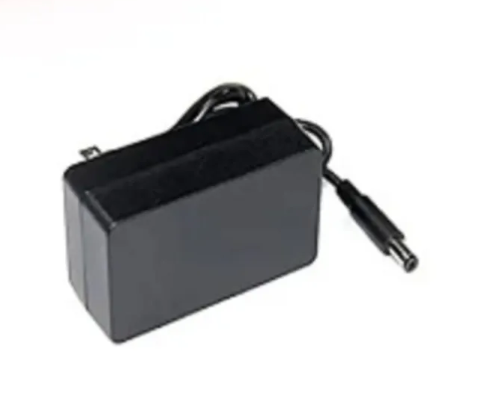 Black power adapter on a white background